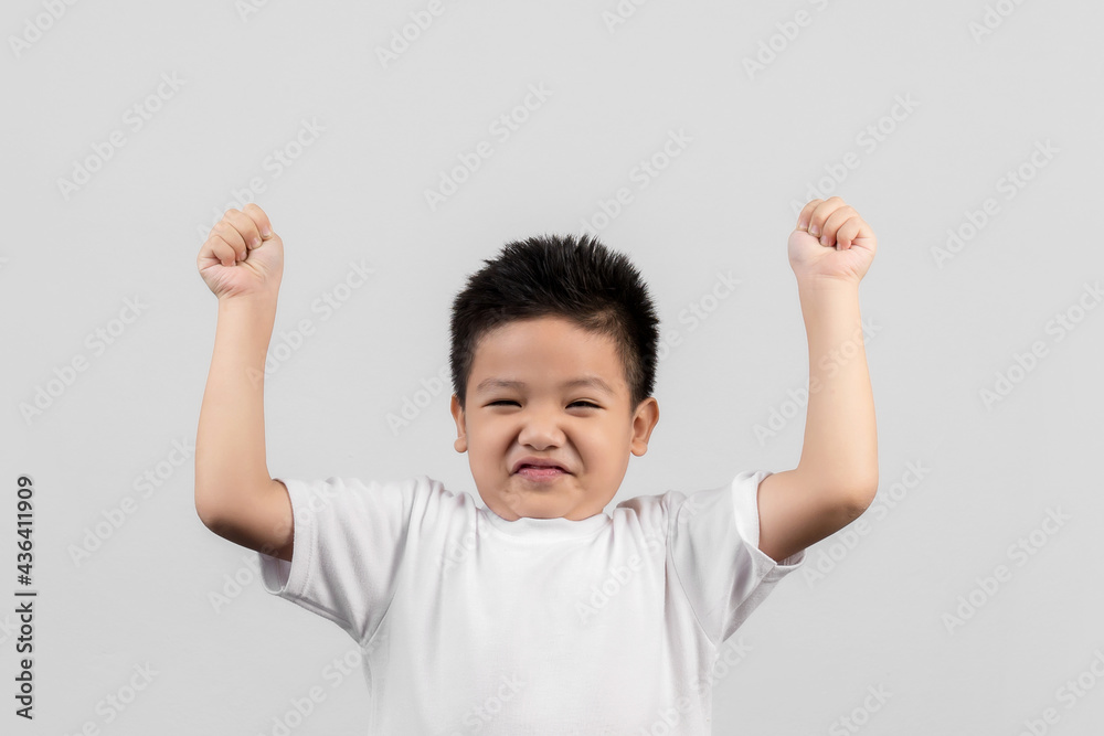 Asian boys studio shot portrait on gray background Asian boys studio shot portrait on gray background