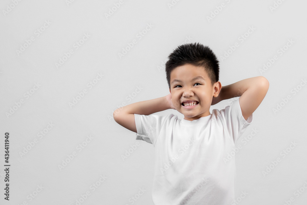 Asian boys studio shot portrait on gray background Asian boys studio shot portrait on gray background