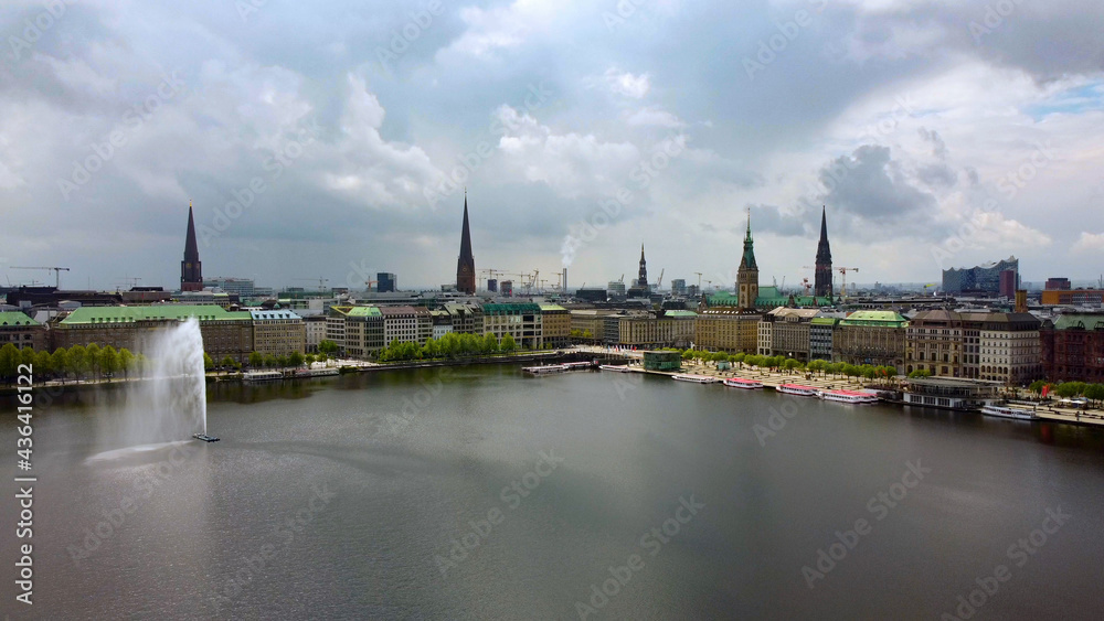 Famous fountain on Alster Lake in the city center of Hamburg - aerial photography