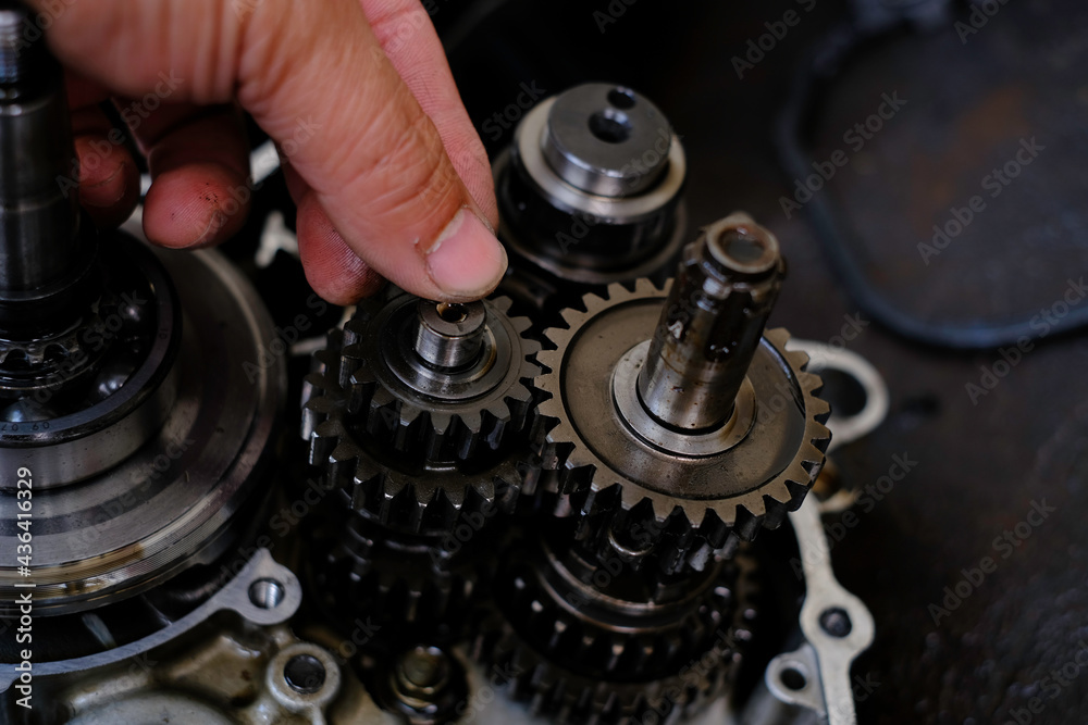 Assemble the motorcycle engine gear by a maintenance technician and check it. Assemble the motorcycle engine gear by a maintenance technician and check it.