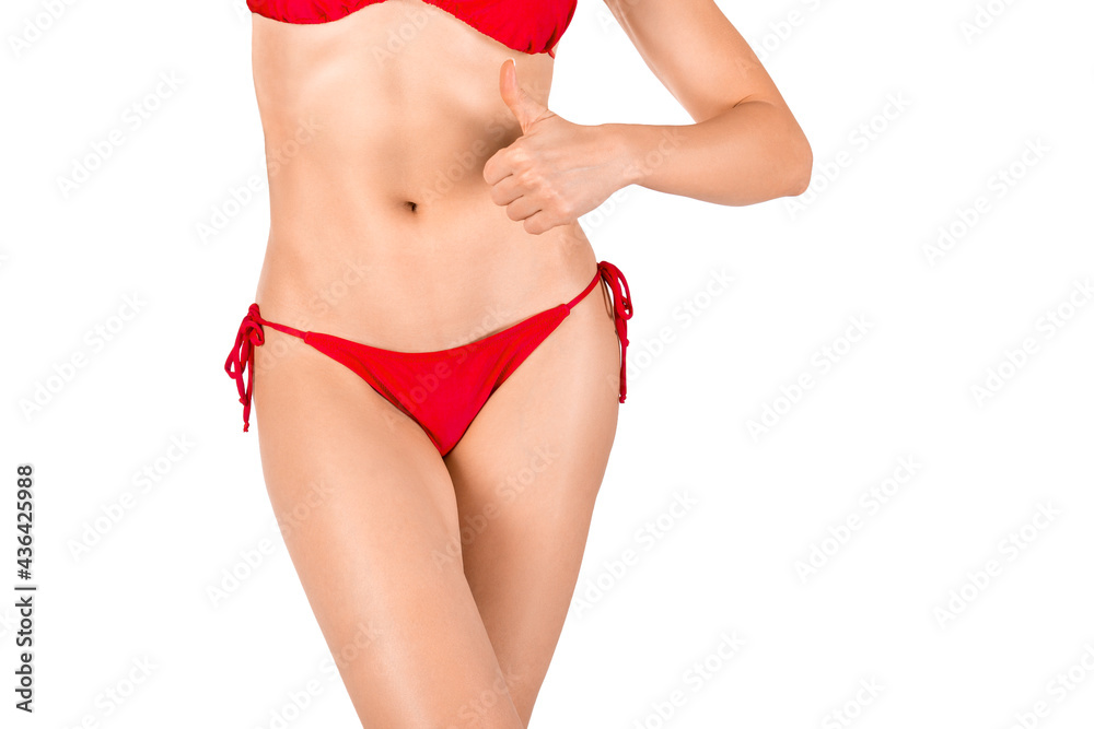 Bikini line depilation. Sexy female lower body in red panties, isolated on white. Caucasian woman show thumbs up.