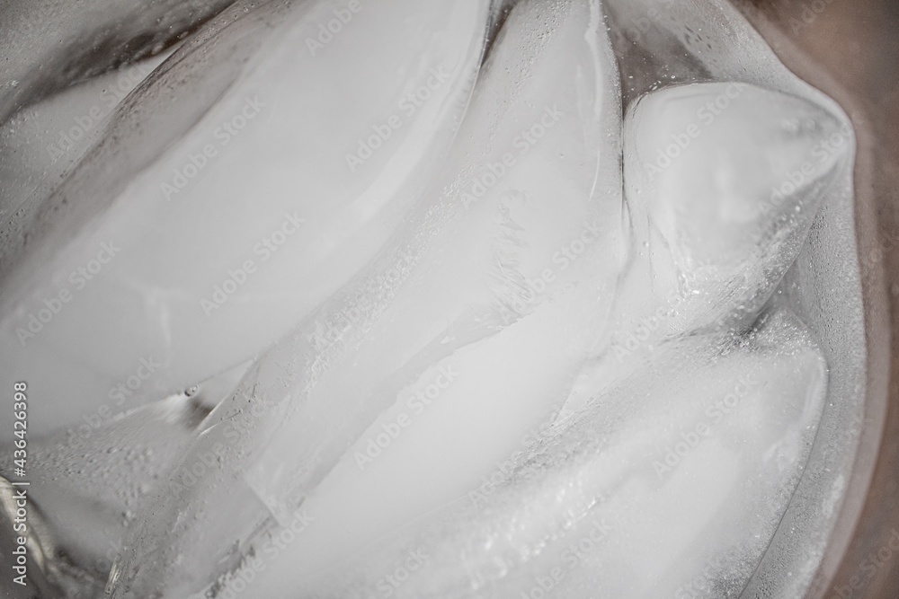 Frozen Ice in a glass to cool down on a hot summer day Frozen Ice in a glass to cool down on a hot summer day