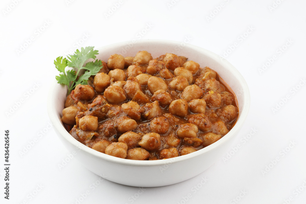 Pindi Chole Kulche or road side choley Kulcha popular in India and pakistan is a popular street food. It's a spicy Chickpea or chana curry served with Indian Flat Bread. Chole masala 