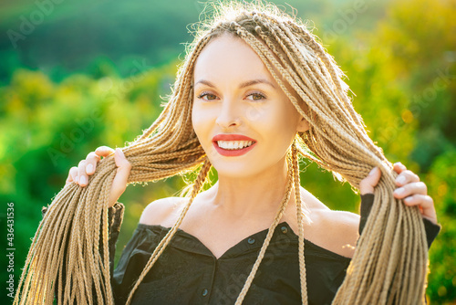 Slika na platnu Woman with long dreadlocks