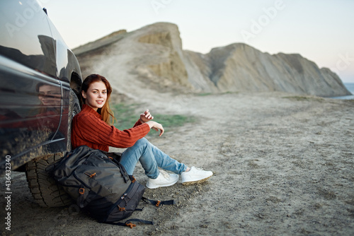 travel woman in sweater backpack tourism mountains landscape fresh air vehicle