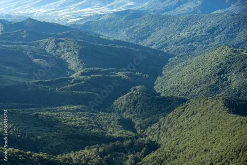 Beautiful sunshine over mountain range. Spring nature landscape.