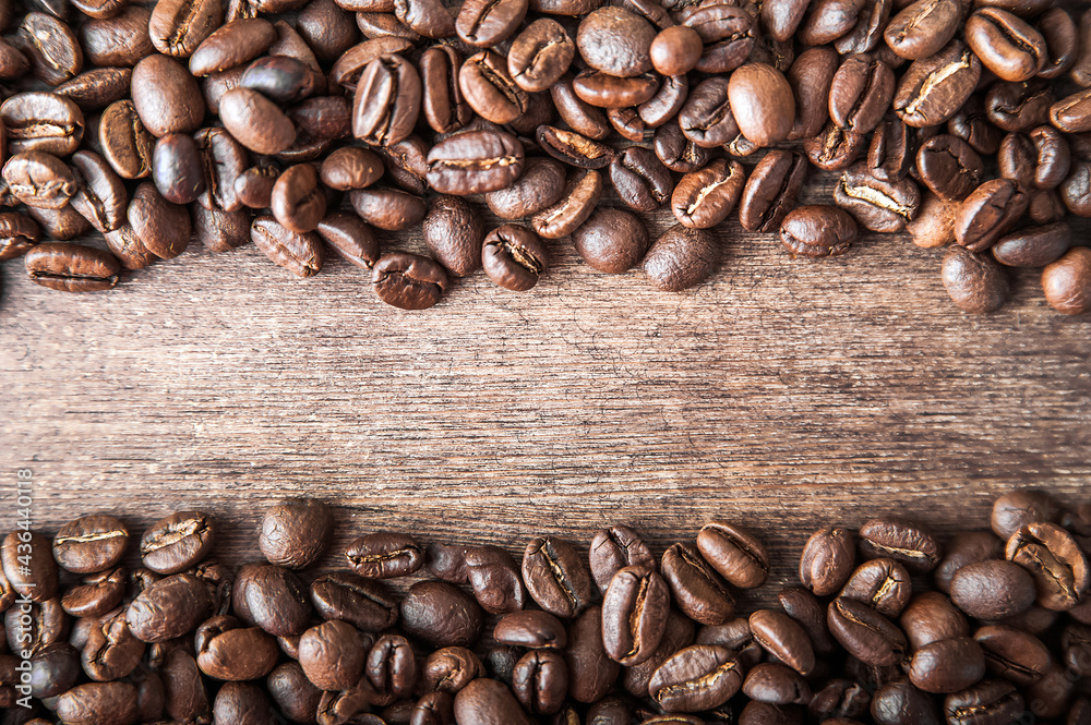 Coffee background close-up macro. Lots of coffee beans and copy space. Coffee background close-up macro. Lots of coffee beans and copy space.