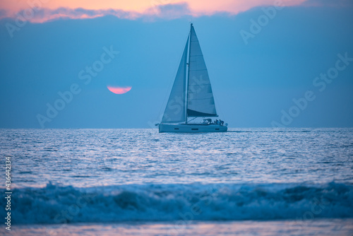 Sailboat on the ocean. Landscape of sea and tropical beach. Beautiful seascape nature. Travel and vacation, copy space.