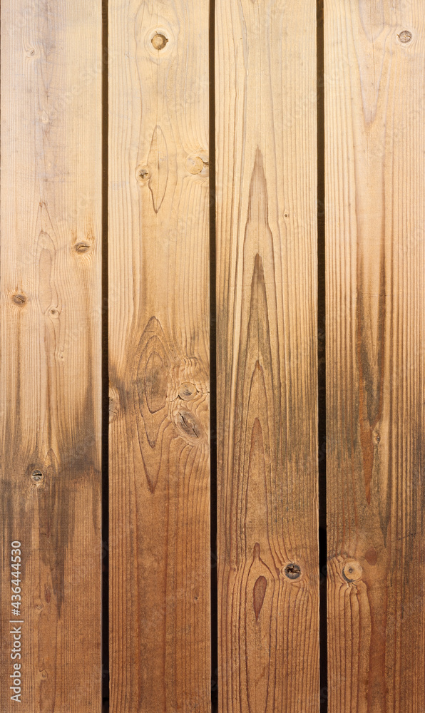 Naklejka premium Vertical wooden background. Orange and yellow colors for your designs