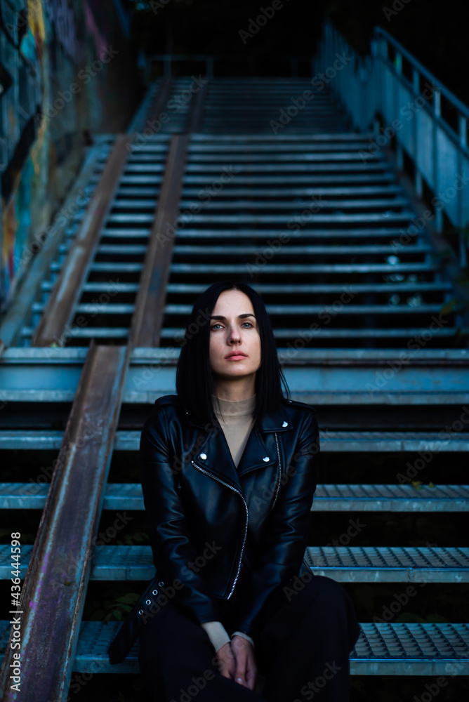 Beautiful woman evening portrait in the city Beautiful woman evening portrait in the city
