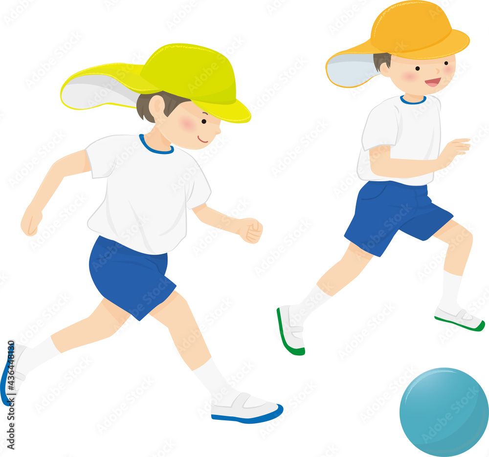 Two kindergarten children playing soccer