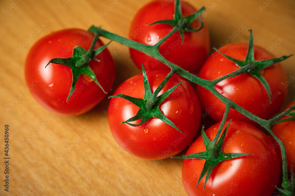 Cherry tomatoes on wood background Cherry tomatoes on wood background