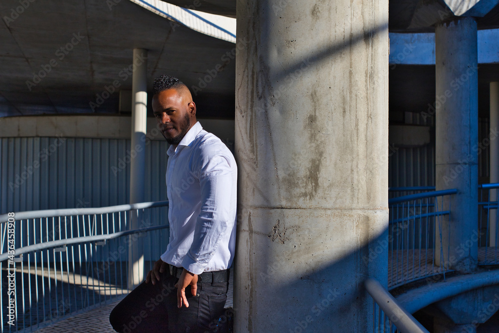 African-American man on a business trip to Europe takes advantage of a few days to go sightseeing in Seville. Spain African-American man on a business trip to Europe takes advantage of a few days to go sightseeing in Seville. Spain