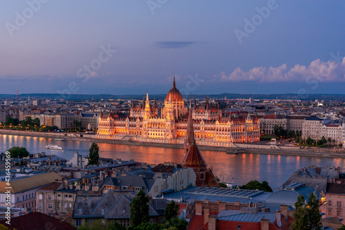 Hungary, evening twilight in Budapest, parliament on the background of night city lights, cityscape