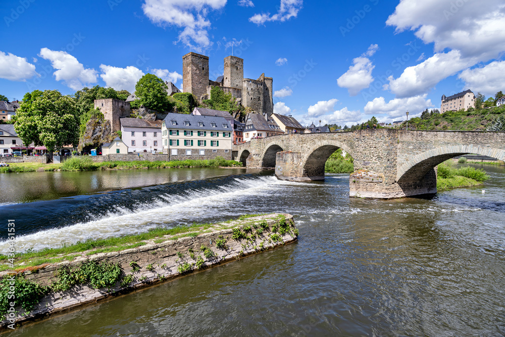 Fototapeta premium river Lahn in Runkel, Germany with old stone bridge and castle