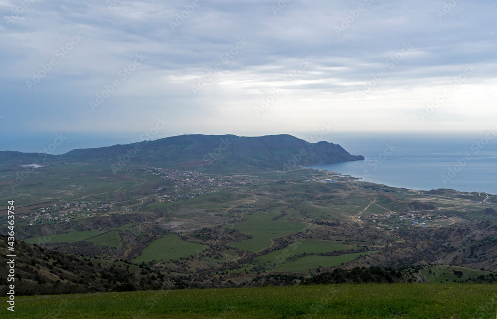 Panorama of the coastal valley from the top of the mountain. Crimea.