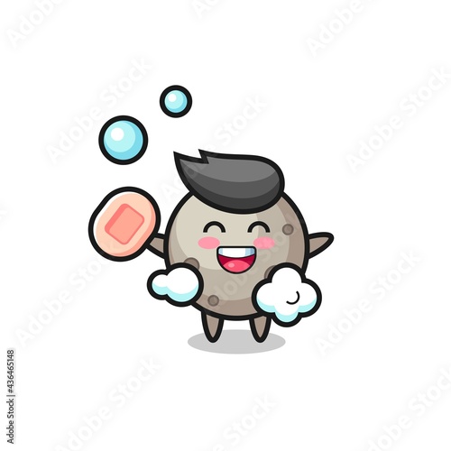 moon character is bathing while holding soap