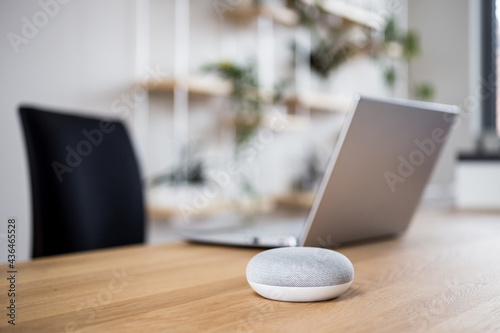 Smart speaker on table desk, voice controlled, device, smart home assistant device