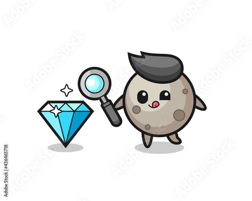 moon mascot is checking the authenticity of a diamond