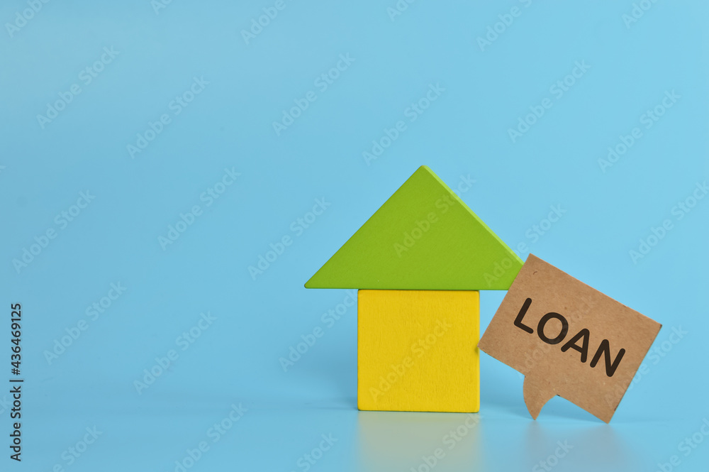 Toy house and speech bubble note written with LOAN Toy house and speech bubble note written with LOAN