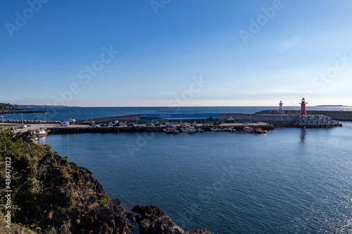 Wallpaper Mural The scenery of Jeju Island with the blue sea and harbor Torontodigital.ca