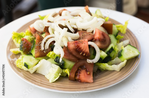 vegetarian healthy vegetable salad on brown plate