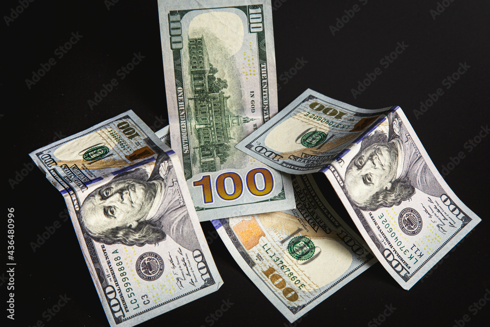 US dollar against black background US dollar against black background