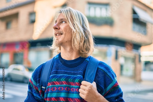 Young scandinavian student man smiling happy standing at the city. © Krakenimages.com