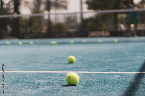 paddle balls on a court