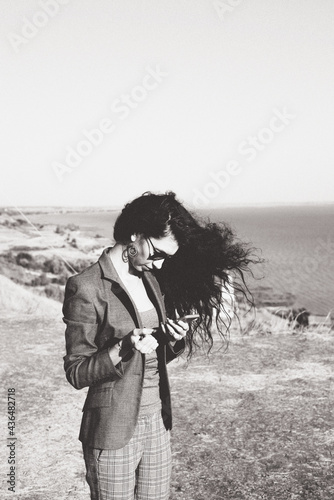 girl outdoors in a classic suit