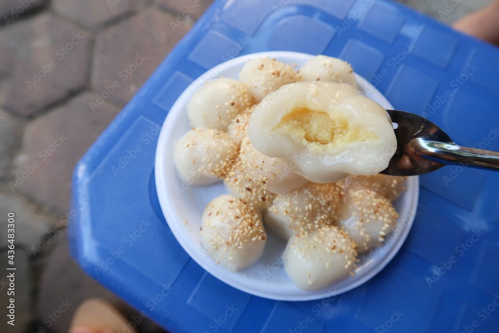 Vietnamese glutinous rice balls (Banh troi) on a bowl on street, with