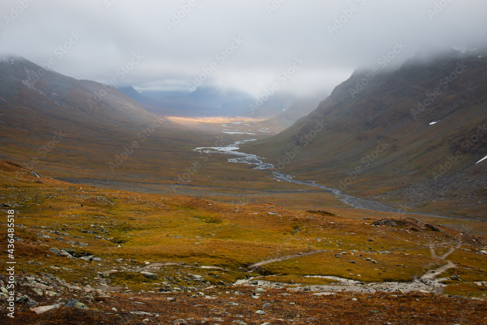 The view of the valley in the direction of Sälka, hiking Kungsleden (king's) trail, rainy day, Lapland, Sweden, September 2020.