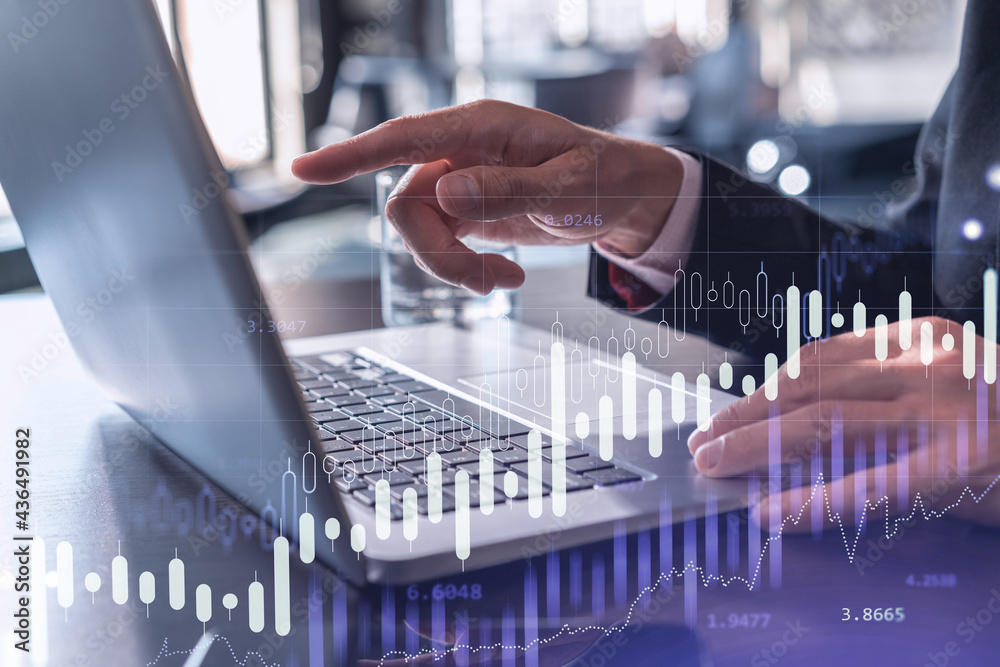 Hands typing the keyboard to research stock market to proceed right investment solutions. Internet trading and wealth management concept. Formal wear. Hologram Forex chart over close up shot. Hands typing the keyboard to research stock market to proceed right investment solutions. Internet trading and wealth management concept. Formal wear. Hologram Forex chart over close up shot.