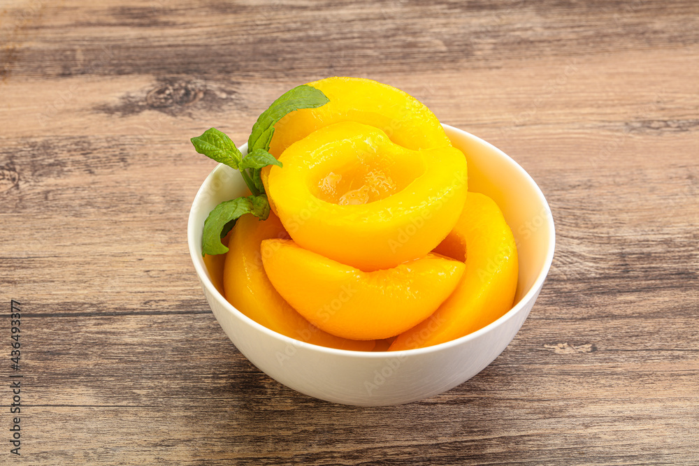 Sweet ripe canned peaches with mint Sweet ripe canned peaches with mint