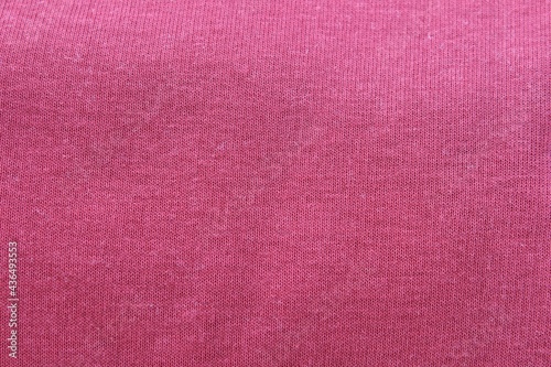 Pink fabric texture background. Textile background with copy space. Space for text.