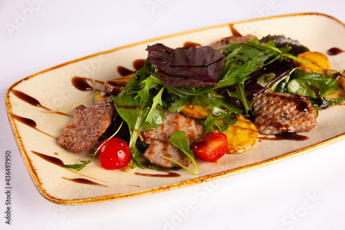Veal with vegetables and sauce