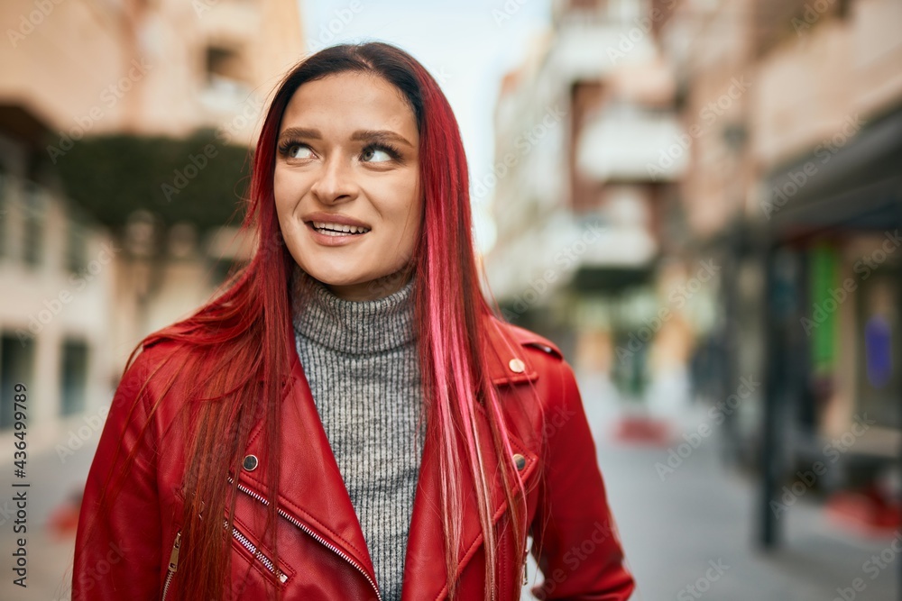 Young caucasian girl smiling happy standing at the city. Young caucasian girl smiling happy standing at the city.