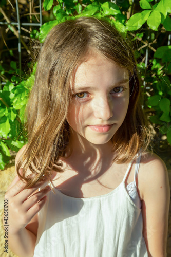 Potrait of Beautiful emotional natural cute teenager girl on a sunny day