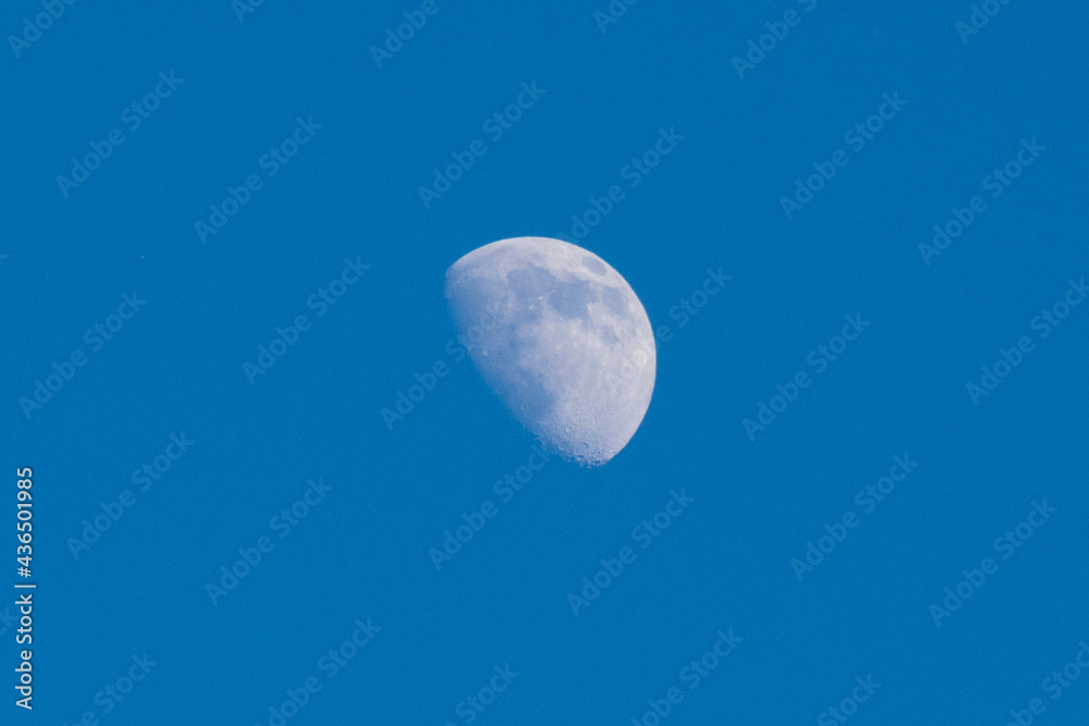 Beautiful sky with moon, copy space, beautiful blue background with place for text Beautiful sky with moon, copy space, beautiful blue background with place for text
