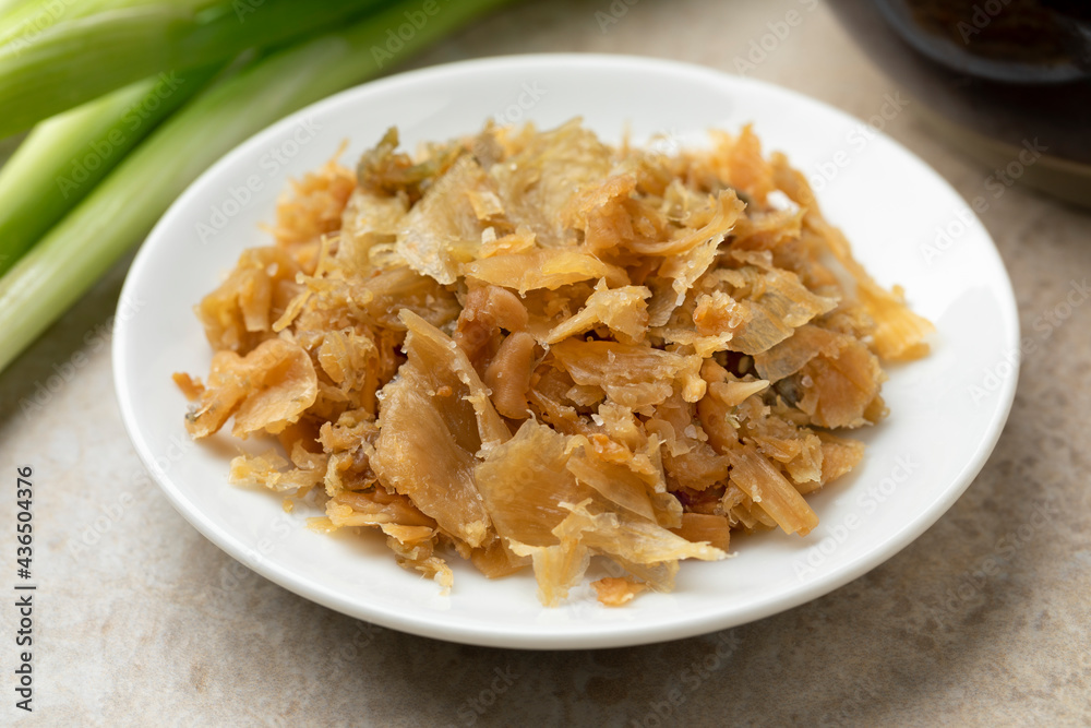 Traditional Chinese fermented cabbage on a  ceramic plate close up 