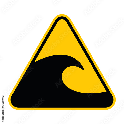 Tsunami hazard zone sign. Vector illustration of yellow triangle warning sign with tsunami wave icon inside. Caution harbour waves. Danger zone. Beware during earthquake symbol.