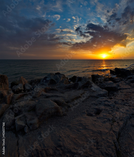 Russia. Dagestan. Dawn on the rocky shore of the Caspian Sea near the city embankment of Makhachkala. © Александр Катаржин