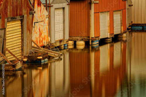 Boathouses Reflecting off Mississippi River in Minnesota
