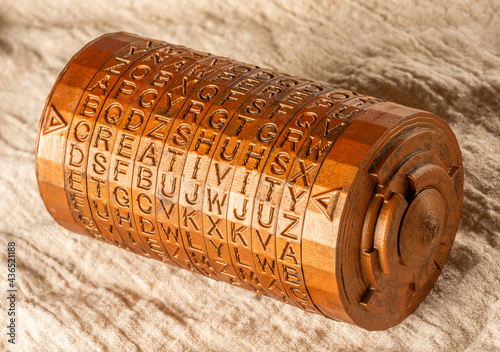 Bronze cryptex invented by Leonardo da Vinci from the book da vinci code. Word creativity as password set by letters rings. Cryptographic equipment printed on a 3D printer