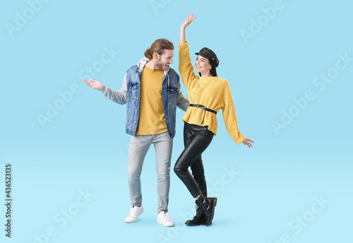 Happy young couple dancing ...