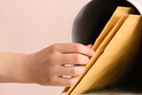 Woman getting letter from box, closeup