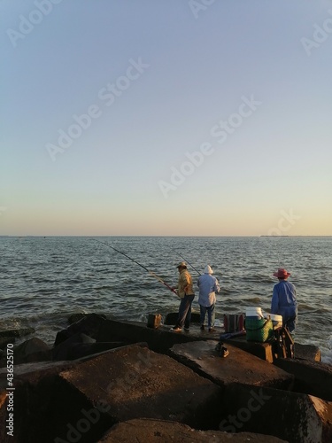 fishing at sunset © Ahmed