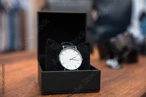 Box with stylish watch