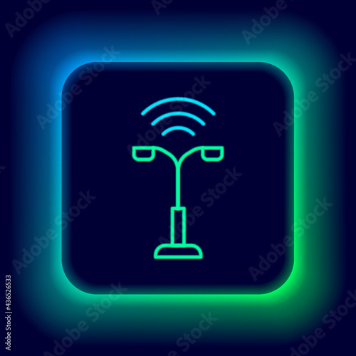 Glowing neon line Smart street light system icon isolated on black background. Internet of things concept with wireless connection. Colorful outline concept. Vector