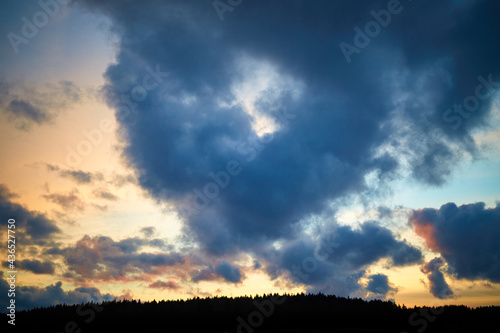 Cumulus cloud shaped heart on sky. Evening sunset. Symbol of love. Natural landscape. Cloudy weather. Valentines day. Wedding sign. Holiday postcard. Heaven. Wallpaper. Outdoor. Beautiful background